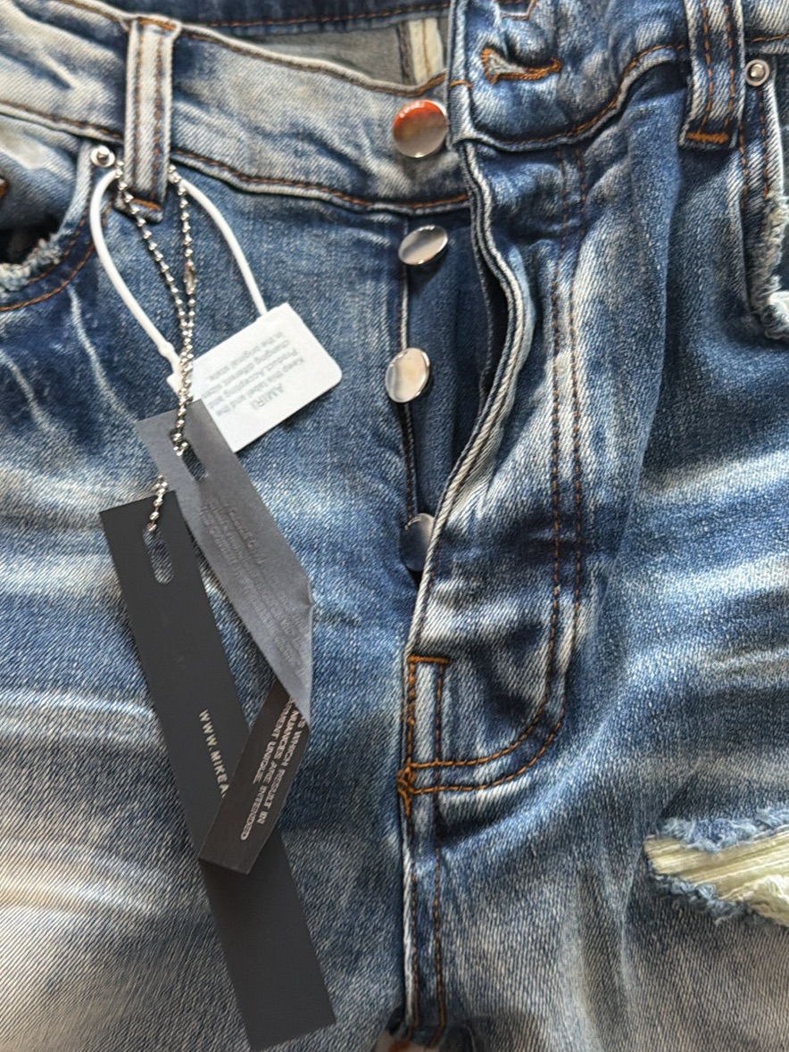 Amiri Faded Blue Distressed Relaxed Jeans